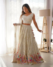 White, silver sequins and multi florals