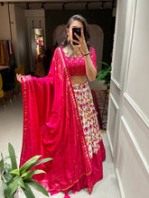 Pink Dola silk and patola print Lehengas