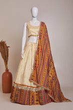 Off white jacquard silk and mirror work Lehenga in mustard