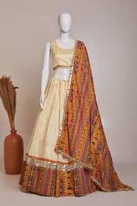 Off white jacquard silk and mirror work Lehenga in mustard