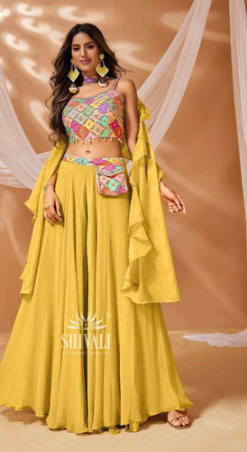Yellow palazzo and colourful embellished top