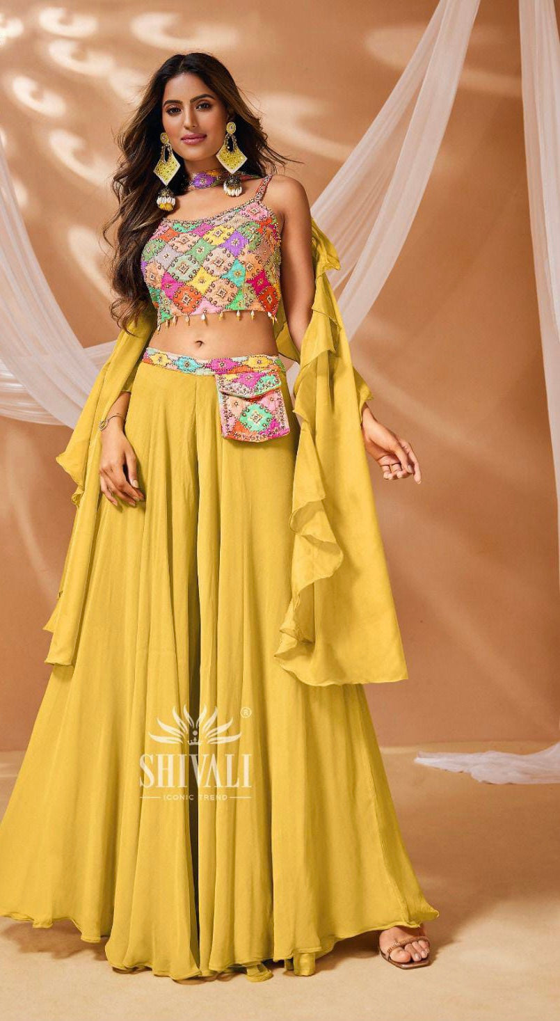 Yellow palazzo and colourful embellished top