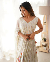 White, silver sequins and multi florals