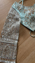 Icy blue lehenga with champagne gold work