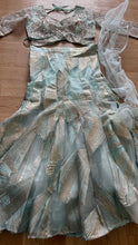 Icy blue lehenga with champagne gold work