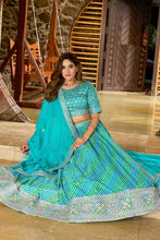 Blue and green Leheriya print organza lehenga