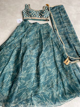 Green Organza silk readymade Lehenga (elbow length sleeves attached)