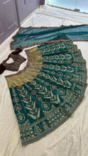 Green and gold silk Lehenga