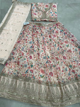 Tinge of cream and pink organza floral Lehenga