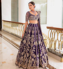 Purple and gold Georgette royal look lehenga