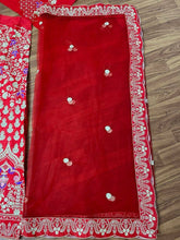 Red elegant gold threadwork Lehenga