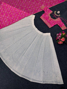 White and pink bandhani lehenga