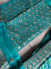 Blue and green Leheriya print organza lehenga