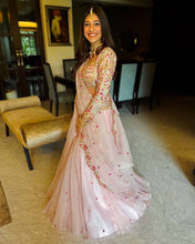 White and bead work embroidered Lehenga