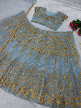 Icy blue with gold embroidered Lehenga set