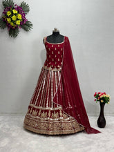 Deep red embroidery and mirror work Lehenga