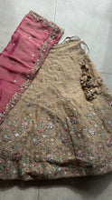 Beige and contrasting pink dupatta lehenga