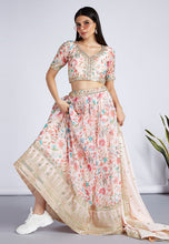 Tinge of cream and pink organza floral Lehenga
