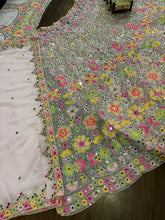 Baby pink floral and mirror embroidered Lehenga