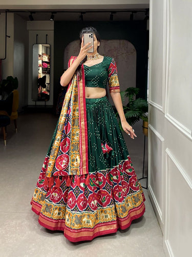 Tussar silk lehengas with bandhej and patola print (skirt stitched) - green