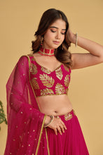 Sara - magenta leaf emblem Lehenga