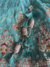 Mint Green Embroidered tissue fabric Lehenga