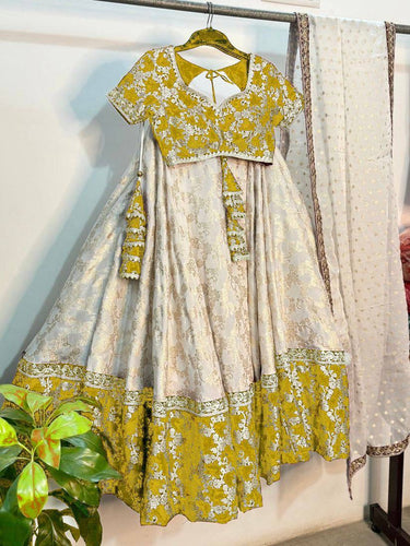 Yellow and off white jacquard Lehenga