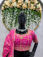 White and pink bandhani lehenga