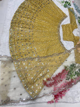Yellow and gold embellished Lehenga