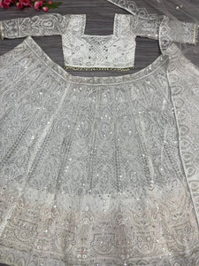 White soft net sequinned Lehenga