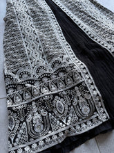 Black gown with jacket and belt