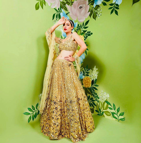 Yellow and gold embellished Lehenga