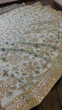 Sky blue and gold motifs Lehenga
