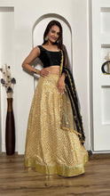 Black and gold silk Lehenga
