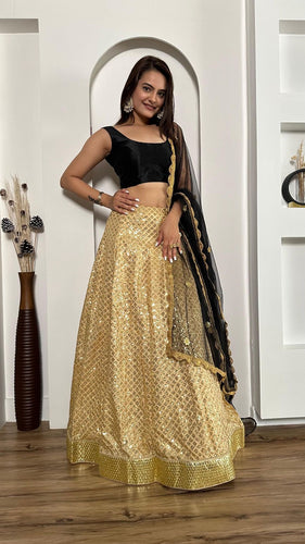 Black and gold silk Lehenga