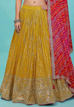 Karla collection - yellow and pink bandhani Lehenga