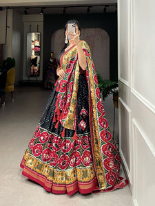 Tussar silk lehengas with bandhej and patola print (skirt stitched) - black