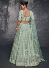 Mint green net embroidered readymade lehenga