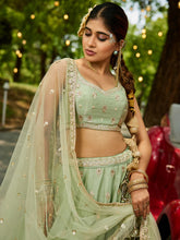 Pista green and gold chinnon embroidered Lehenga