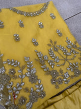 Yellow and silver super soft net lehenga
