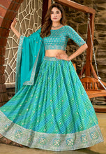Blue and green Leheriya print organza lehenga