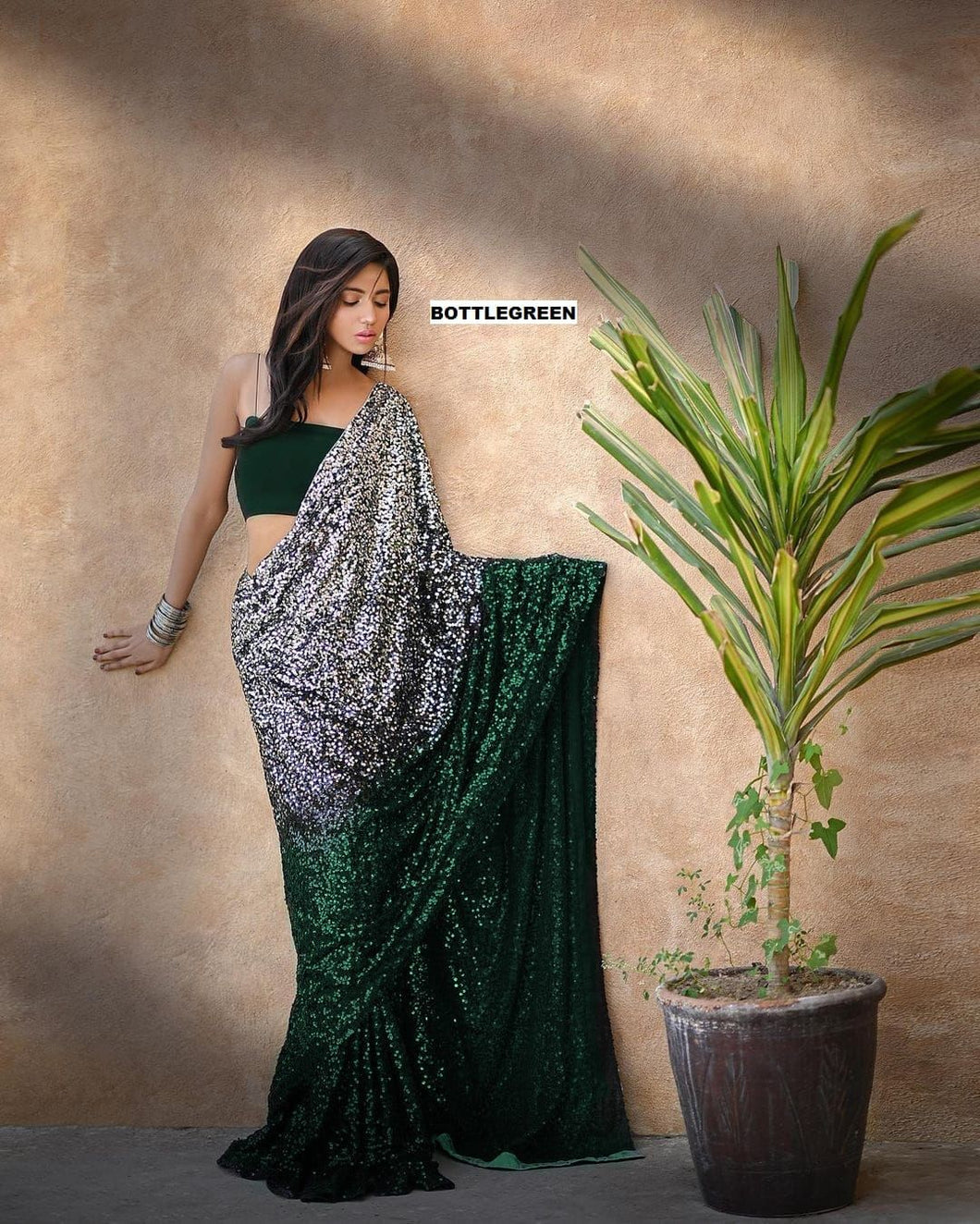 Bollywood khichdi  sequins saree in bottle green