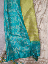 Ivory silk anarkali with green bandhani print dupatta