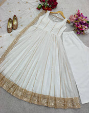 White georgette gown with gold sequins
