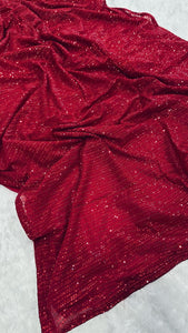 Red sequinned saree