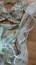 Icy blue lehenga with champagne gold work