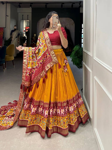 Tussar silk lehengas with patola print (skirt stitched) - mustard and red