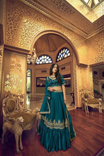 Royal collection - lino silk and satin ruffle style lehenga in emerald green