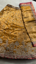 Mustard tissue embroidered lehenga