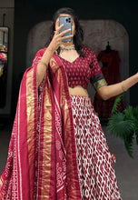 Tussar silk ikkat print Lehenga in maroon (skirt stitched)